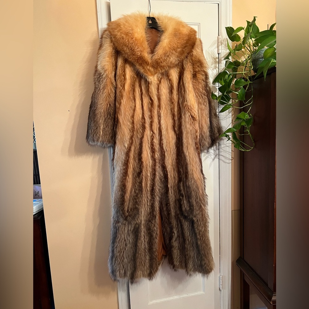 Raccoon fur floor length coat